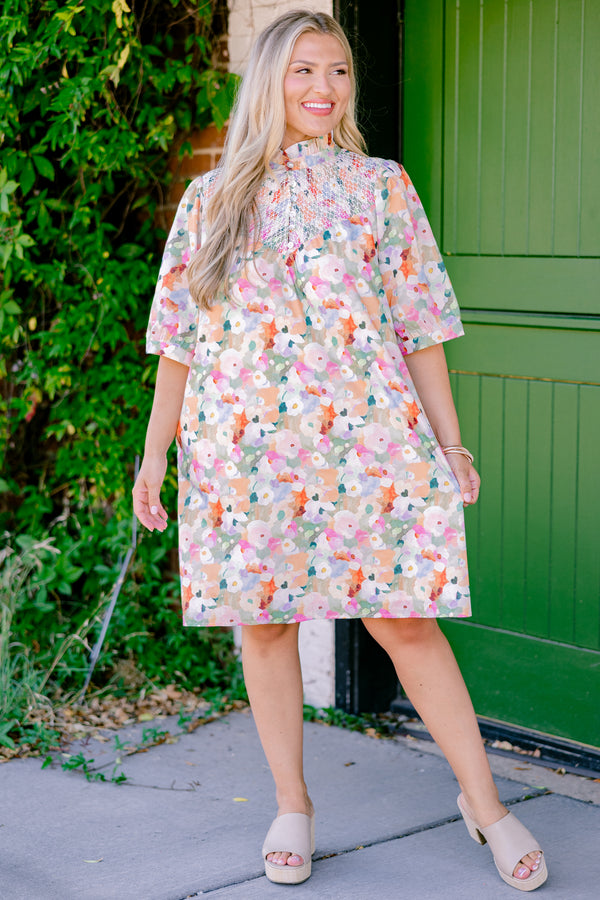 Chic Soul plus size clothing, pink multi colored short sleeve dress with an abstract floral pattern a high neck and a ruffle detailed collar 