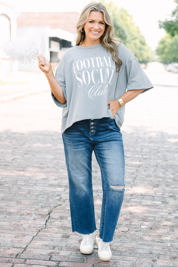 Plus Size steel blue vintage wash tee with Football Social Club graphic and unfinished hems.