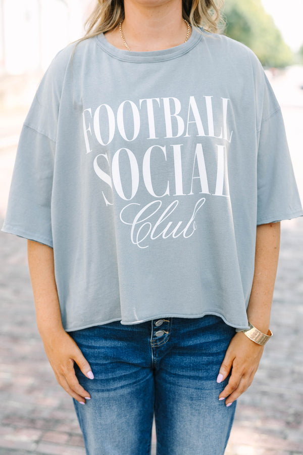 Plus Size steel blue vintage wash tee with Football Social Club graphic and unfinished hems.