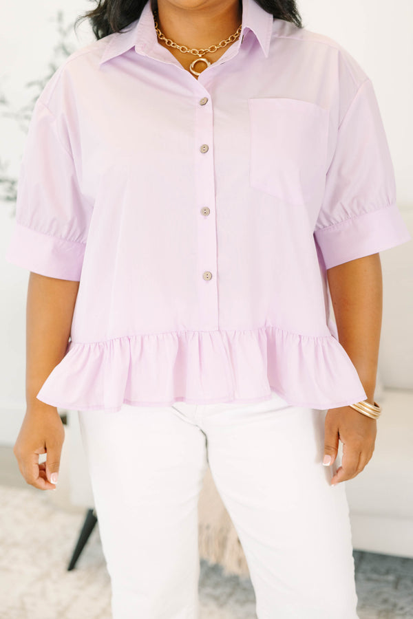 Plus Size lilac button-down top with short puff sleeves, a collar, and a ruffled peplum hem.