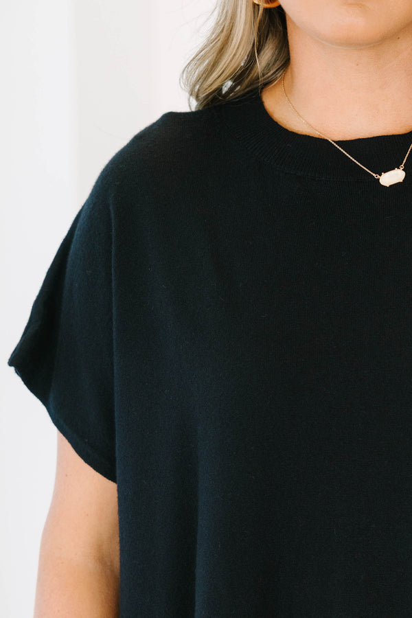 Plus Size black oversized sweater with short sleeves and a delicate lace hem detail.