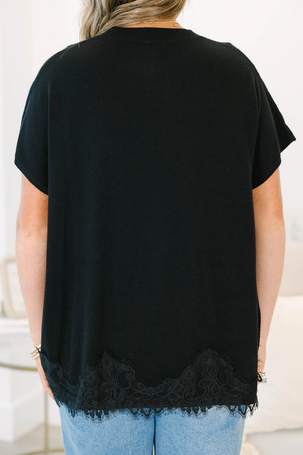 Plus Size black oversized sweater with short sleeves and a delicate lace hem detail.