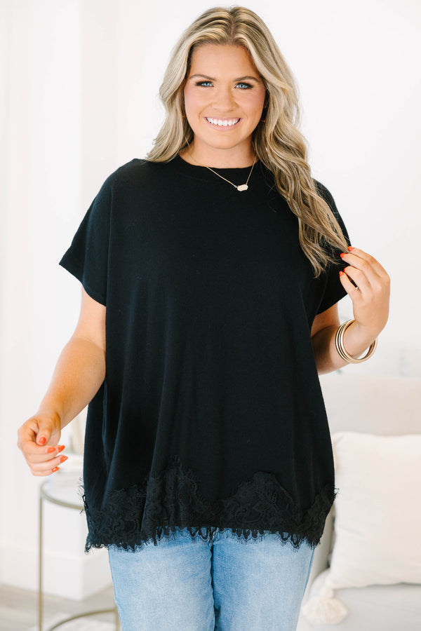 Plus Size black oversized sweater with short sleeves and a delicate lace hem detail.
