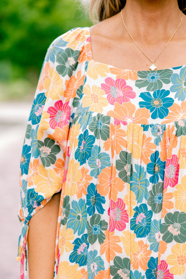 Chic Soul plus size clothing, pink yellow and blue floral pattern on white drawstring cuff half-sleeve square neckline flowy above the knee dress