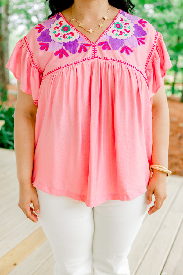 Chic Soul plus size clothing, light pink short-flutter sleeve shallow v-neck top with hot pink embroidered trim along neckline and shoulders plus purple and white embroidered pattern on shoulders