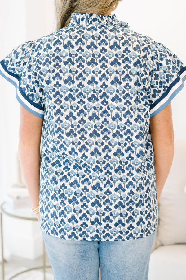 Plus Size navy and white floral print cotton top with a split neckline and short flutter sleeves.