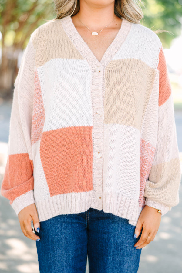 Plus size colorblock knit cardigan in multi-color peach, tan, and cream with a relaxed, flowy fit.