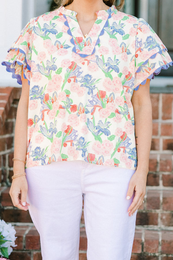 Chic Soul plus size clothing, blue floral multi print short sleeve top with v neckline and tiered ruffle sleeves with scalloped purple edges along sleeves and neckline