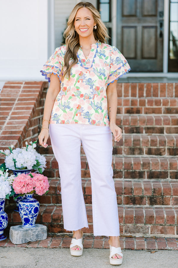Chic Soul plus size clothing, blue floral multi print short sleeve top with v neckline and tiered ruffle sleeves with scalloped purple edges along sleeves and neckline