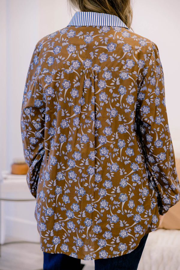 Chic Soul plus size clothing, brown long sleeve button up blouse with a collar and blue floral print and blue pin stripe fabric along the buttons and collar