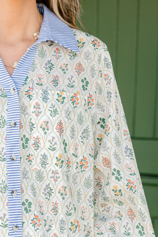 Chic Soul plus size clothing, cream colored long-puff sleeve collared button-up pocket top with leafy floral pattern and blue and white striped blocking around collar and buttons