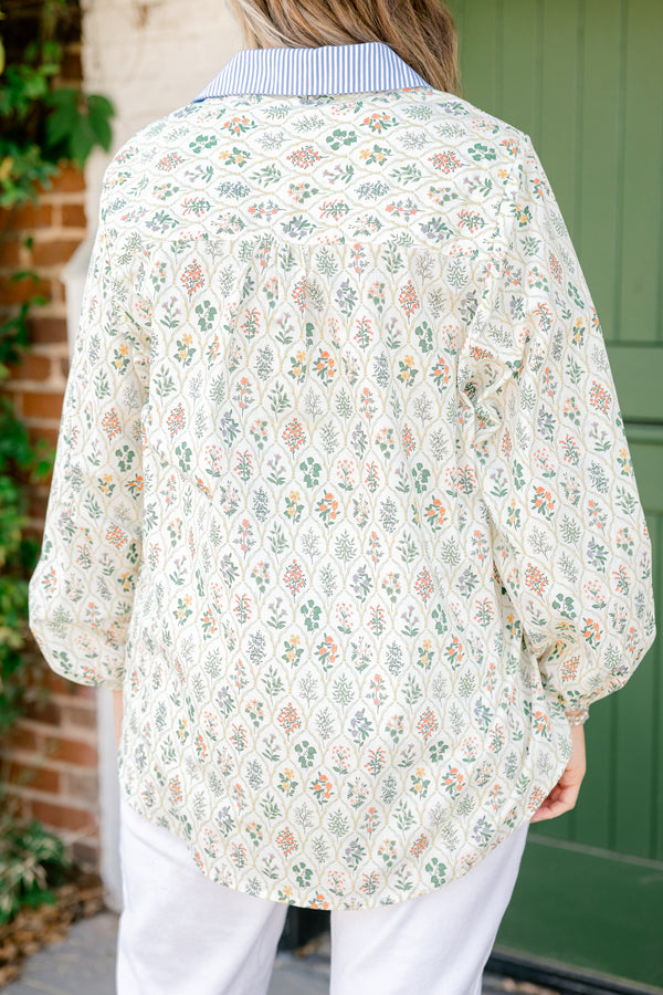 Chic Soul plus size clothing, cream colored long-puff sleeve collared button-up pocket top with leafy floral pattern and blue and white striped blocking around collar and buttons