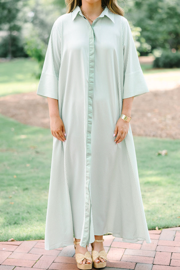 Plus Size green and white striped maxi shirt dress with quarter sleeves and front button closure.