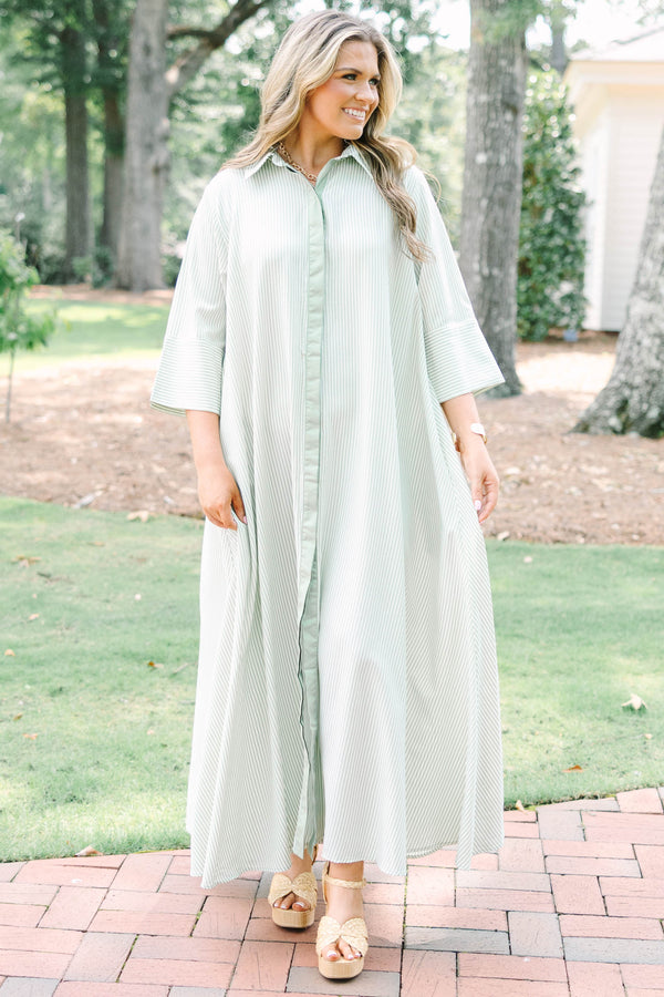 Plus Size green and white striped maxi shirt dress with quarter sleeves and front button closure.