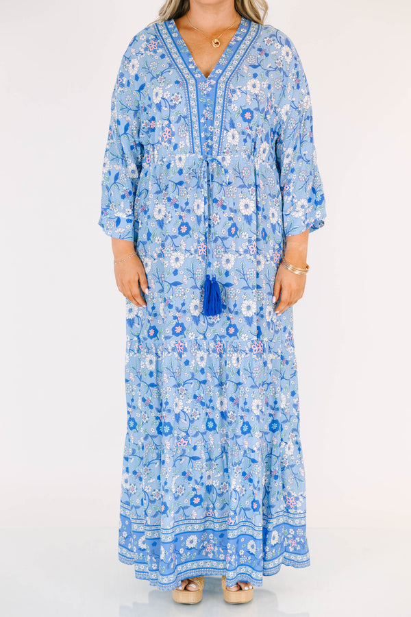 Plus Size blue floral maxi dress with long sleeves, a V-neckline, and tassel drawstring waist.