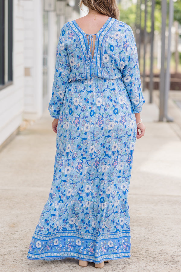 Plus Size blue floral maxi dress with long sleeves, a V-neckline, and tassel drawstring waist.