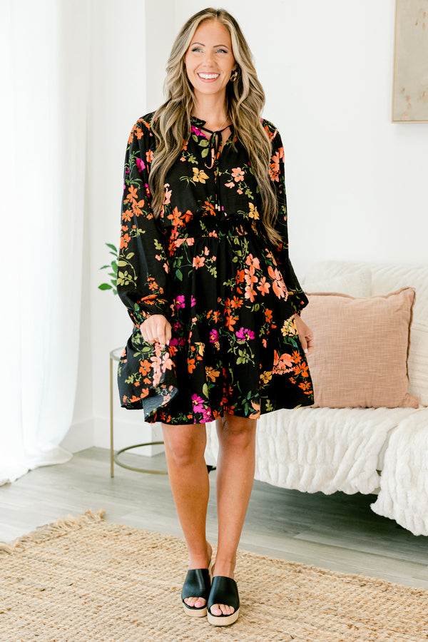 Chic Soul plus size clothing, black baby doll dress with long sleeves and a multi-color floral pattern throughout the dress 