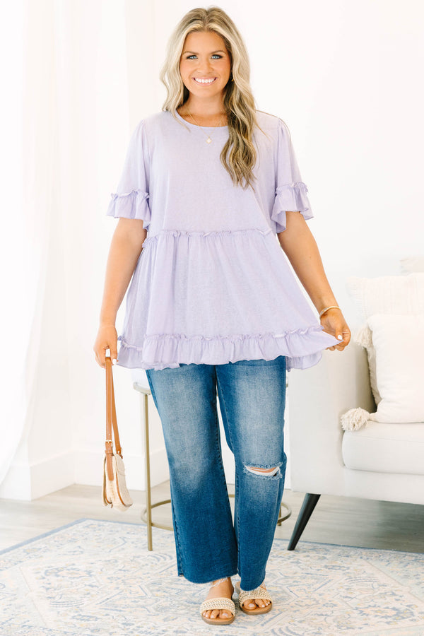 Plus Size purple babydoll top with ruffle trim on the short sleeves, waistline, and hem.