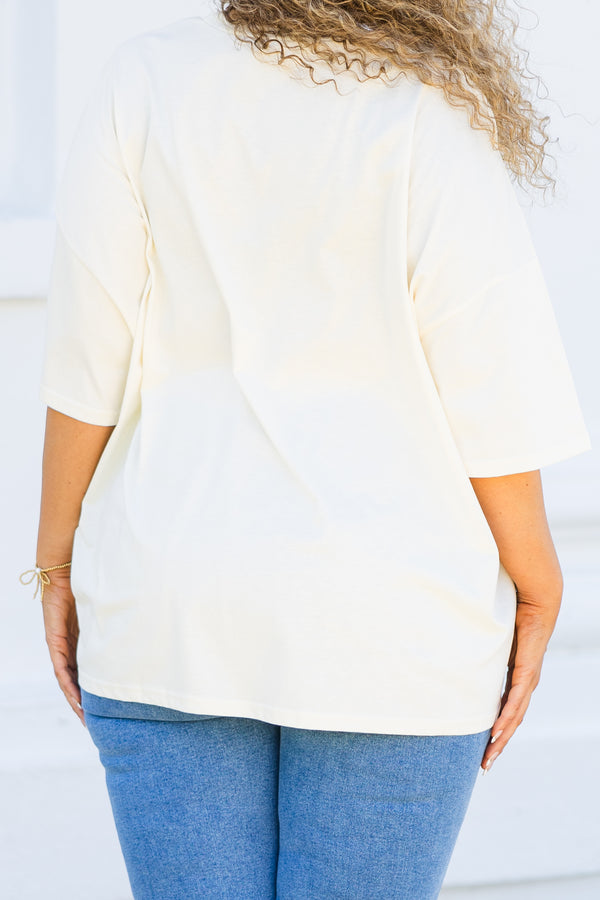 Chic Soul plus size clothing, short-sleeve ivory boyfriend tee with scoop-neckline and pink and white floral graphic lettering stating 