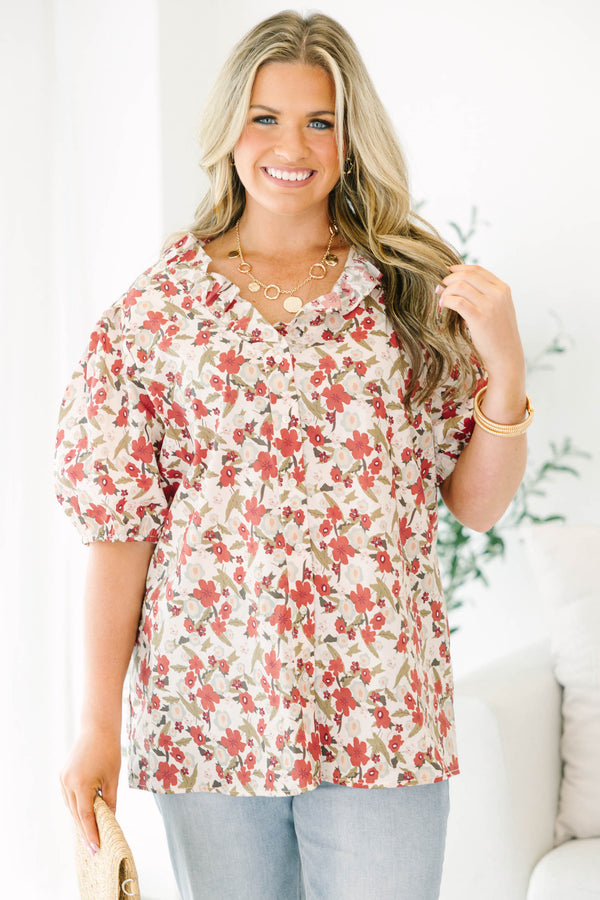 Plus Size red floral print top with a ruffled neckline, button-down front, and puff sleeves.