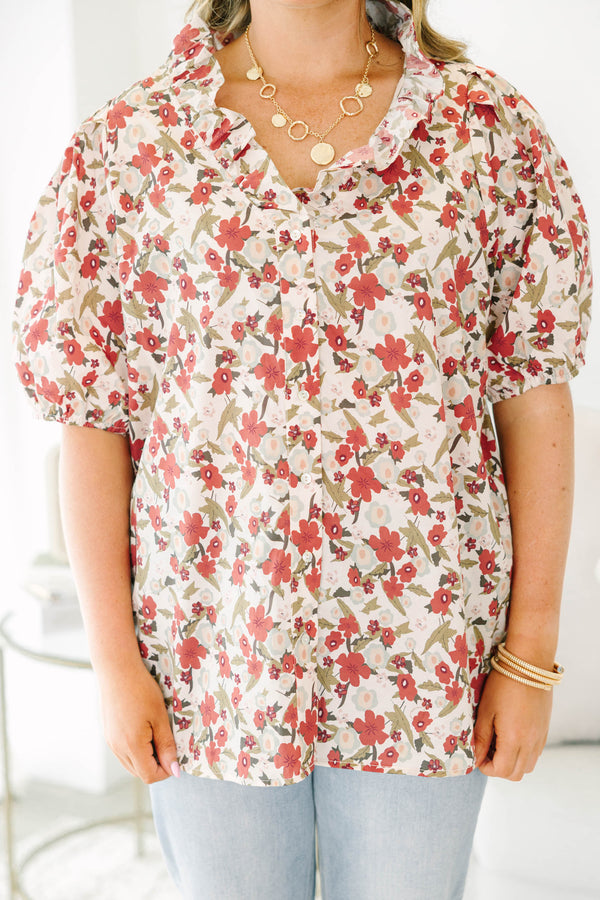 Plus Size red floral print top with a ruffled neckline, button-down front, and puff sleeves.