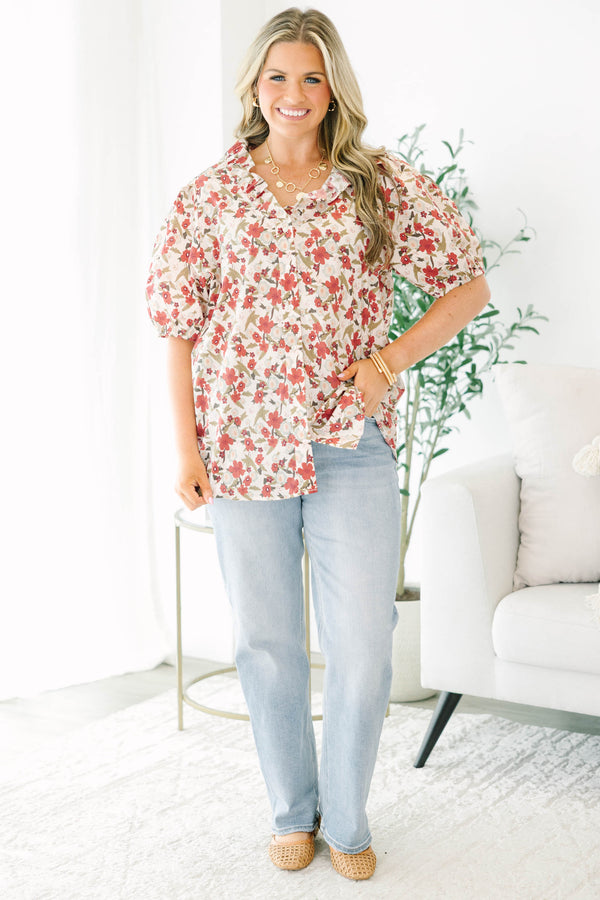 Plus Size red floral print top with a ruffled neckline, button-down front, and puff sleeves.