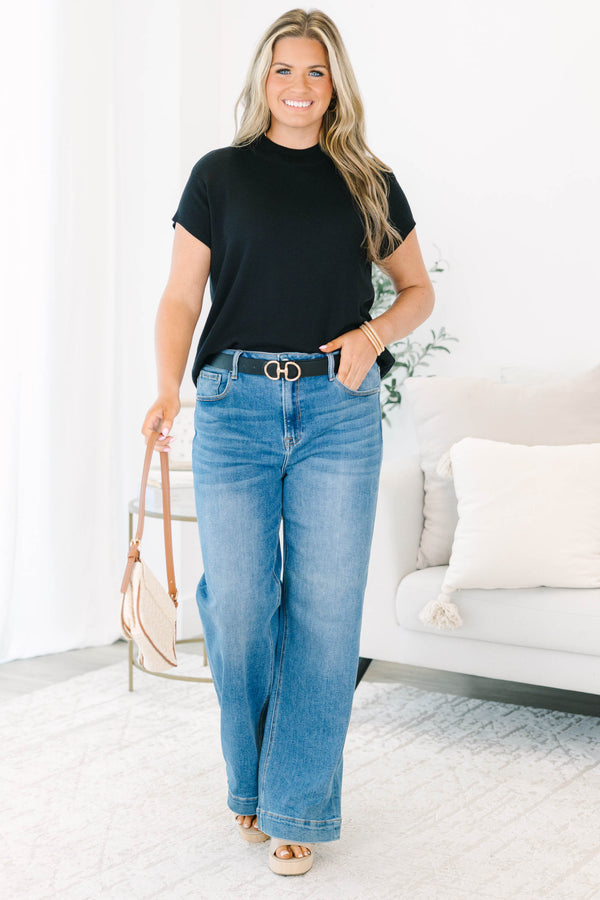 Plus Size short sleeve black knit sweater with a mock neckline and relaxed fit.