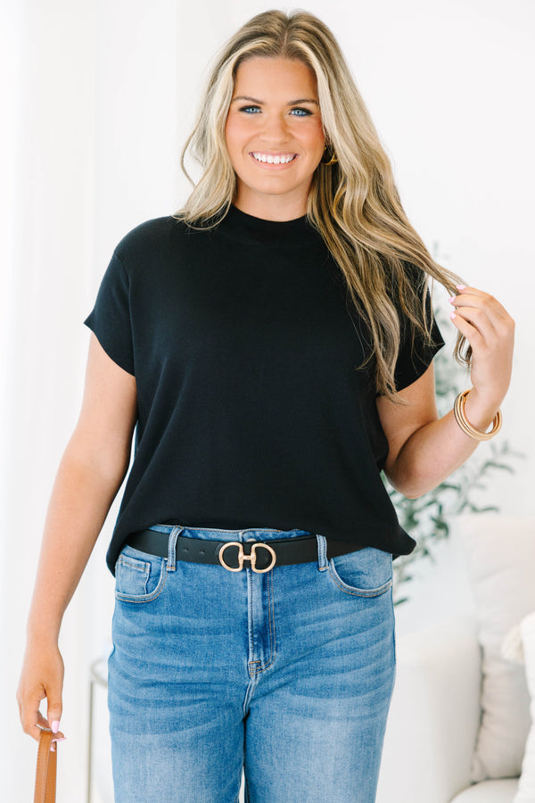 Plus Size short sleeve black knit sweater with a mock neckline and relaxed fit.