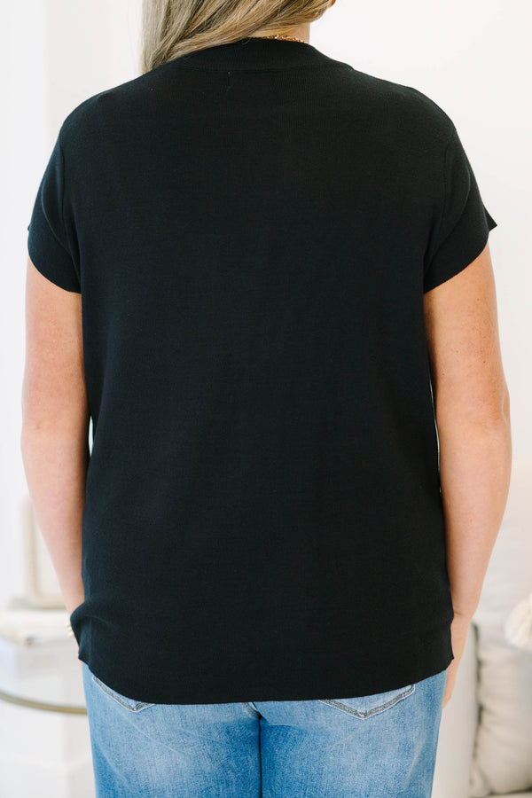 Plus Size short sleeve black knit sweater with a mock neckline and relaxed fit.