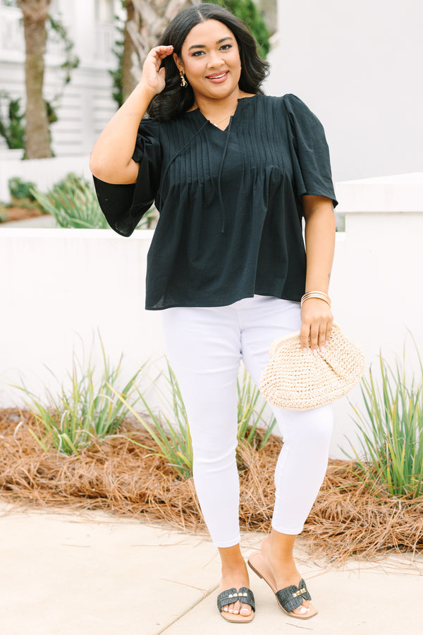Chic Soul plus size clothing, black top with short sleeves a slight v-neckline and rouching along the chest area 