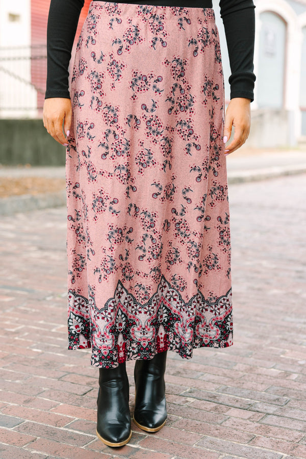 Plus Size pink floral maxi skirt with a bold border print hem and relaxed silhouette.