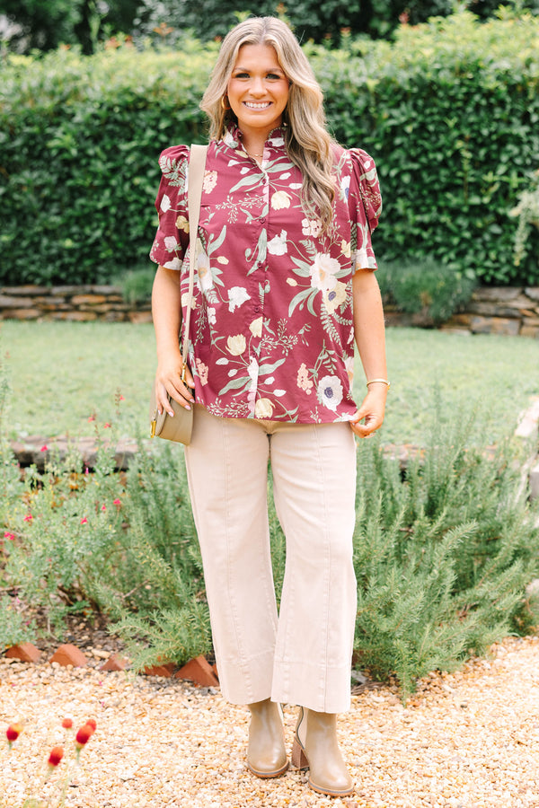 Plus Size burgundy floral button-down top with puff short sleeves and a high collar.