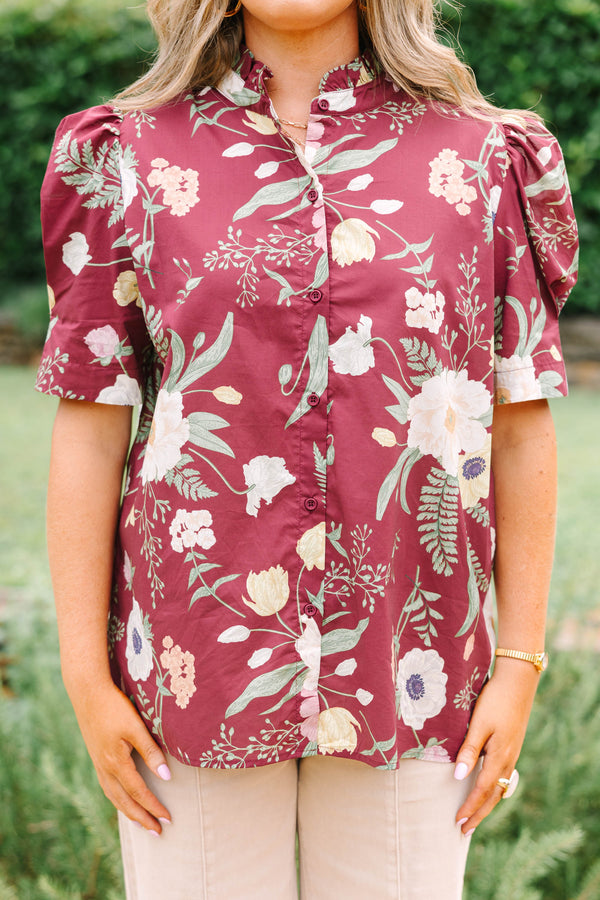 Plus Size burgundy floral button-down top with puff short sleeves and a high collar.