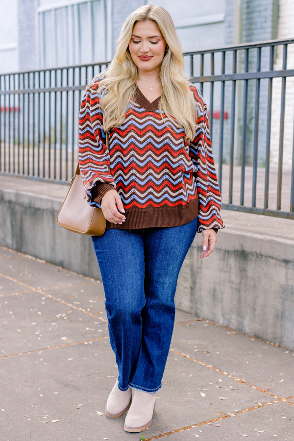 Chic Soul plus size clothing, brown-multi long sleeve sweater with a brown red and blue wavy pattern  and a slight v-neckline