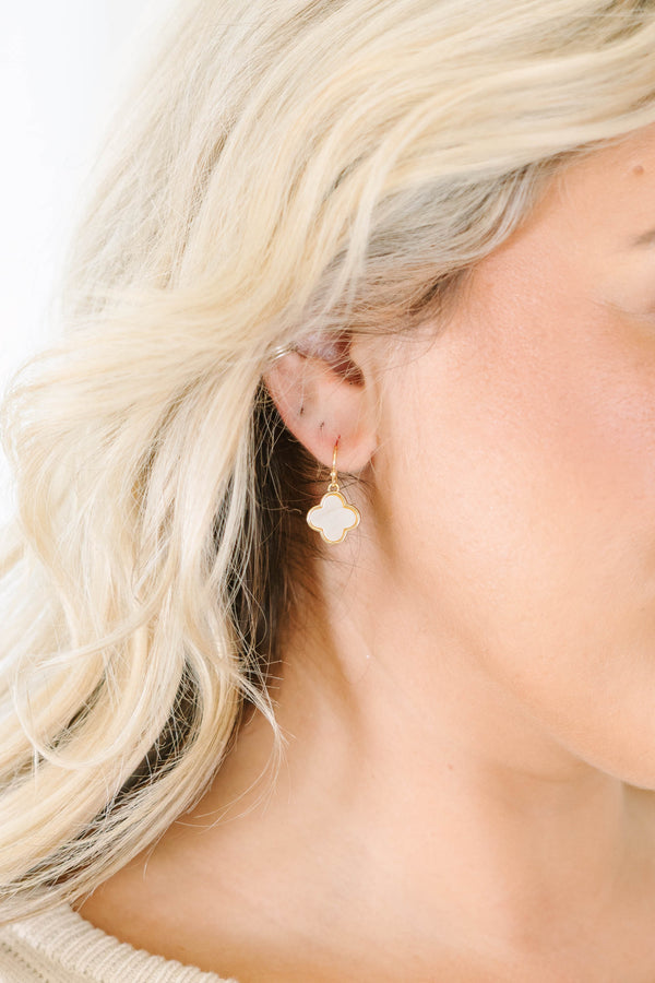 Golden Bloom Earrings, gold-trimmed white clover dangles with mother-of-pearl inlay.