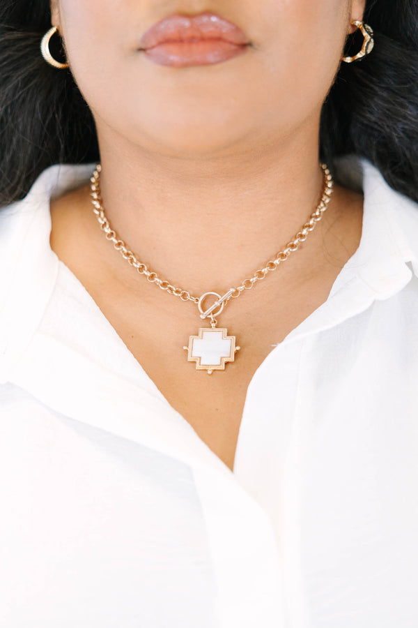 Plus Size gold toggle chain necklace with a white mother of pearl cross pendant.