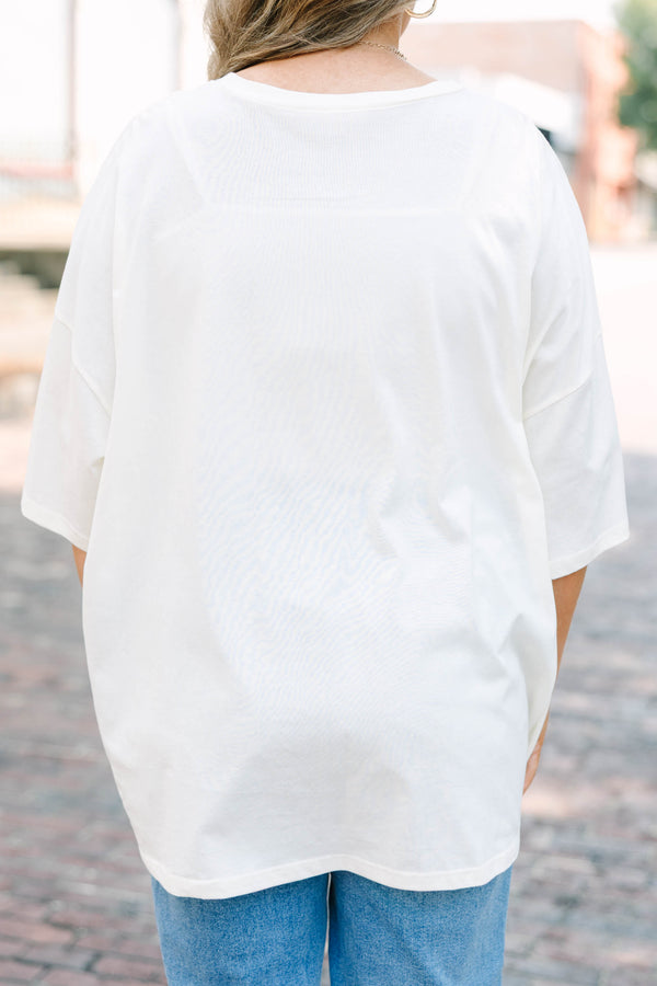 Plus Size ivory oversized boyfriend tee with a football graphic 