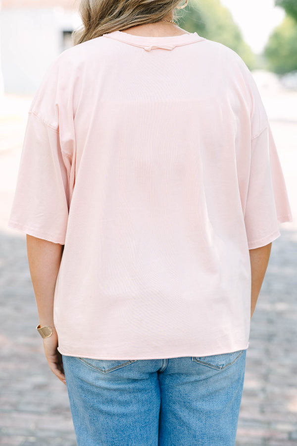 Plus Size vintage wash blush pink t-shirt with pink GAME DAY text, crew neck, and unfinished hem.