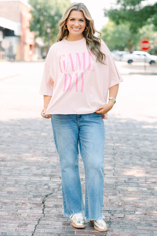 Plus Size vintage wash blush pink t-shirt with pink GAME DAY text, crew neck, and unfinished hem.