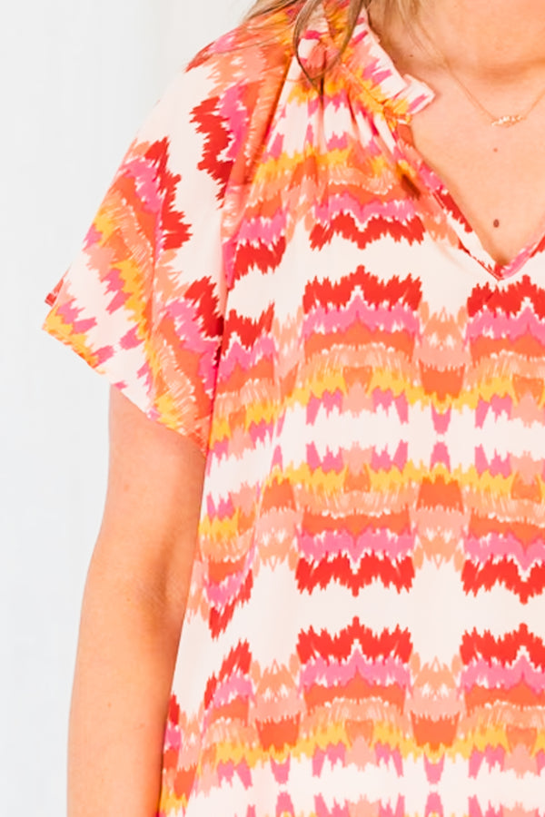 Chic Soul plus size clothing, short sleeve pink combo abstract print top with v neckline