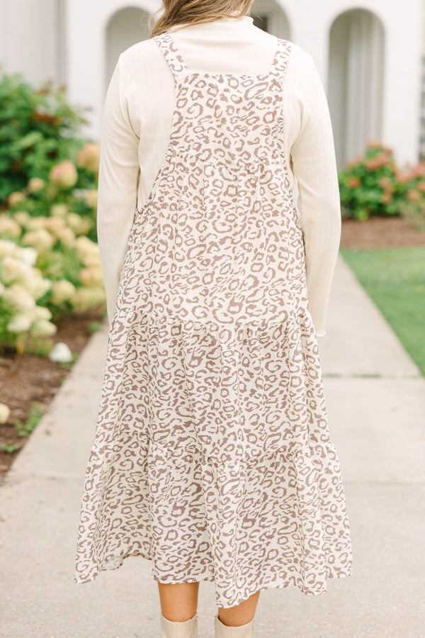 Plus Size light brown leopard print midi dress with a tiered skirt, pinafore style, and pockets.