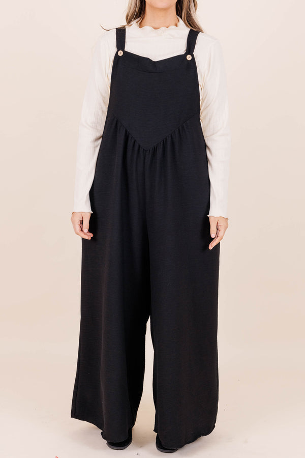 Chic Soul plus size clothing, black full length flowy jumpsuit with adjustable straps and triangle shape front seam detail