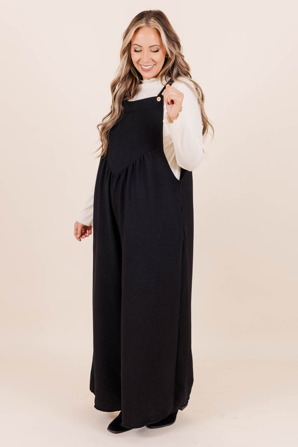 Chic Soul plus size clothing, black full length flowy jumpsuit with adjustable straps and triangle shape front seam detail