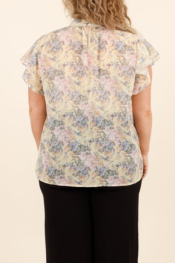 Chic Soul plus size clothing, yellow floral pattern top with flutter sleeves and a high neckline