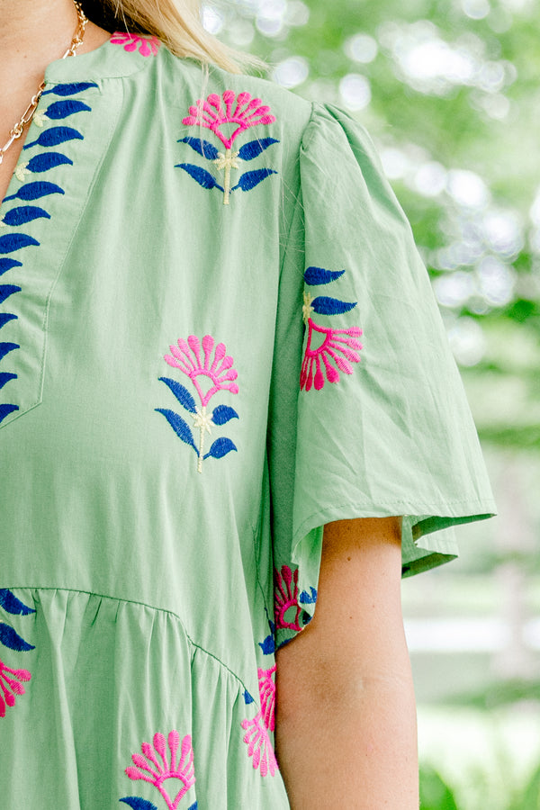 Chic Soul plus size clothing, sage green short-flutter sleeve slit neckline tiered maxi dress with embroidered royal blue and hot pink floral pattern and blue leaves lining the neckline plus pale yellow trim detail