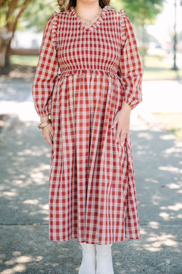 Plus Size red plaid midi dress with a smocked bodice, ruffled neckline, and long balloon sleeves.