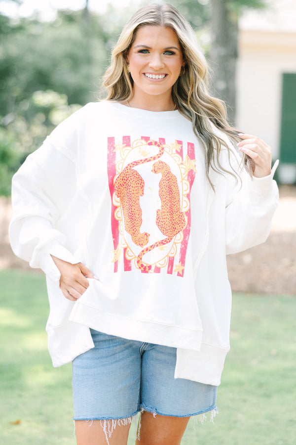 Plus size woman ivory sweatshirt with an orange and hot pink cheetah graphic 