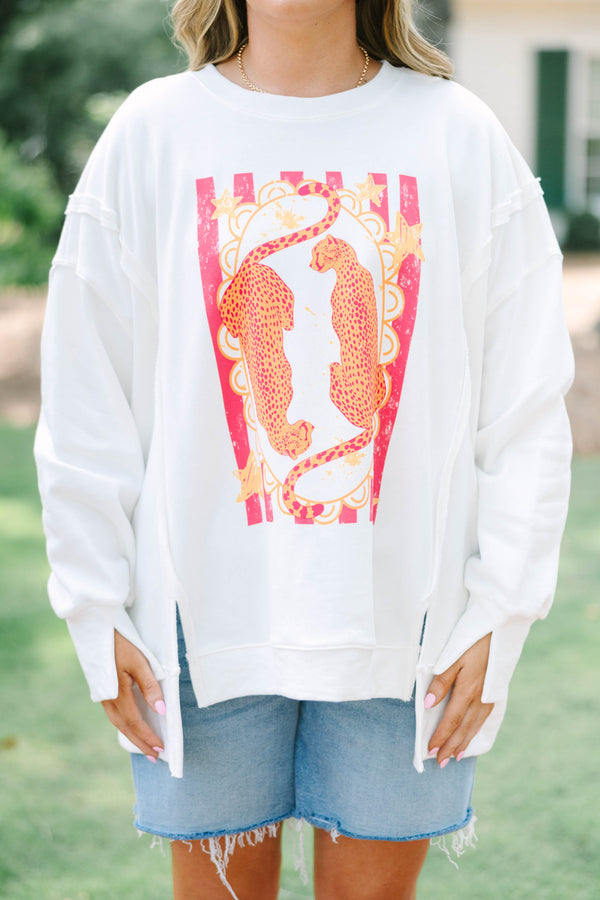 Plus size woman ivory sweatshirt with an orange and hot pink cheetah graphic 