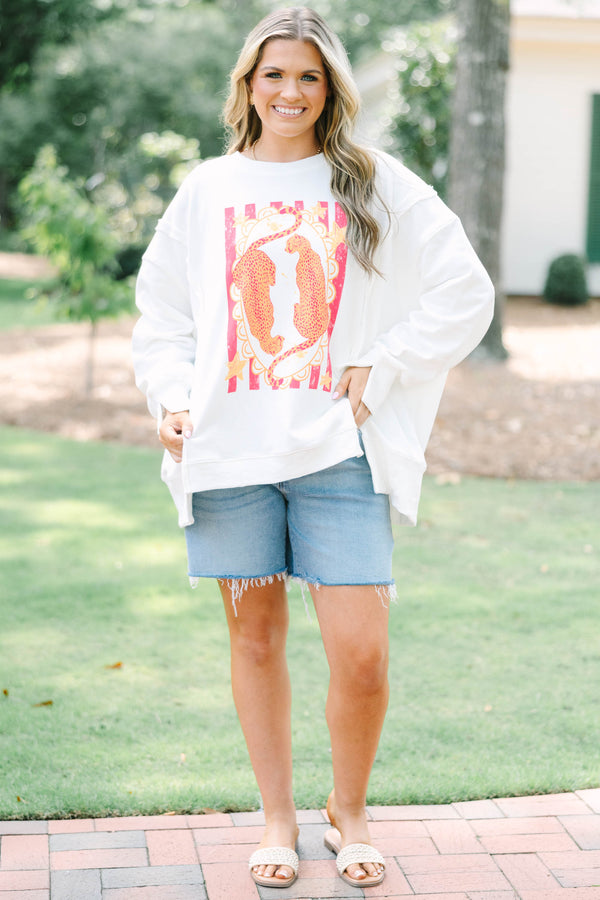 Plus size woman ivory sweatshirt with an orange and hot pink cheetah graphic 