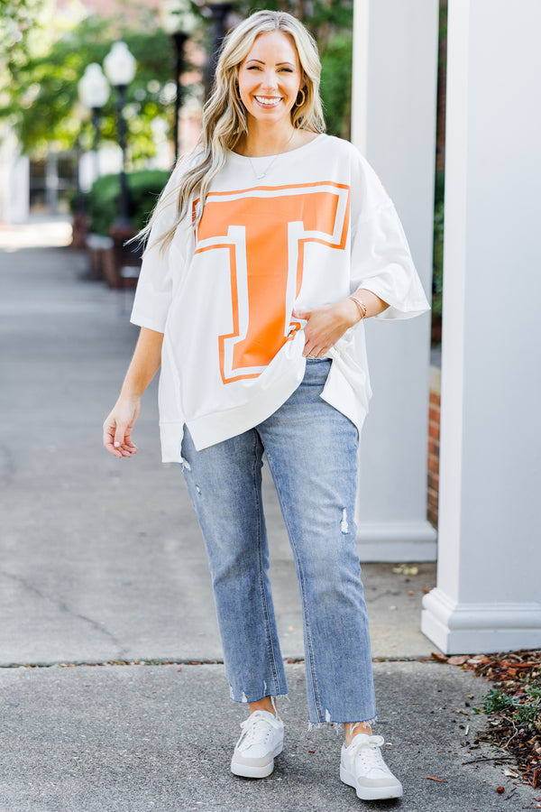 Chic Soul plus size clothing, short-sleeve off-white tee with scoop-neckline and orange graphic capital 